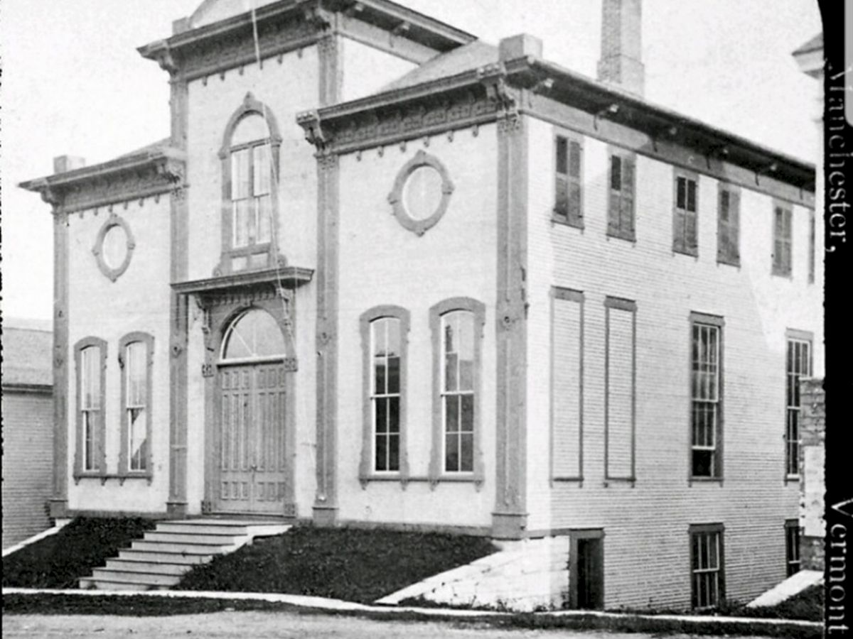 The image shows a historical building labeled as "Music Hall, Manchester, Vt.—No. 140," featuring steps leading to a large door.